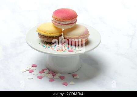 Macarons on decorative plate, Germany Stock Photo