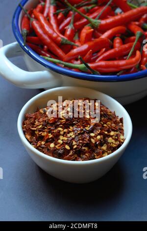 Chili flakes in shell and chilli peppers, Germany Stock Photo