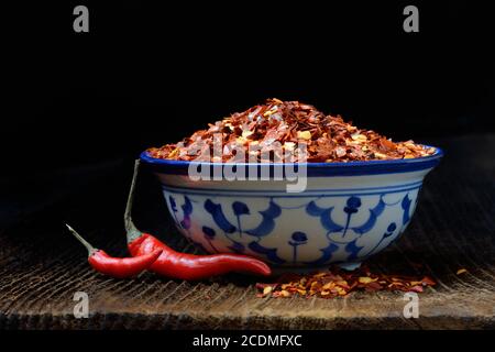 Chili flakes in shell and chilli peppers, Germany Stock Photo