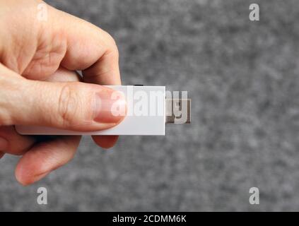 USB Drive in the Hand Stock Photo