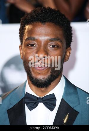 Santa Monica, United States. 28th Aug, 2020. (FILE) Chadwick Boseman Dead at 43 After Battle With Colon Cancer. PASADENA, LOS ANGELES, CALIFORNIA, USA - JANUARY 15: Actor Chadwick Boseman arrives at the 49th NAACP Image Awards held at the Pasadena Civic Auditorium on January 15, 2018 in Pasadena, Los Angeles, California, United States. (Photo by Xavier Collin/Image Press Agency) Credit: Image Press Agency/Alamy Live News Stock Photo