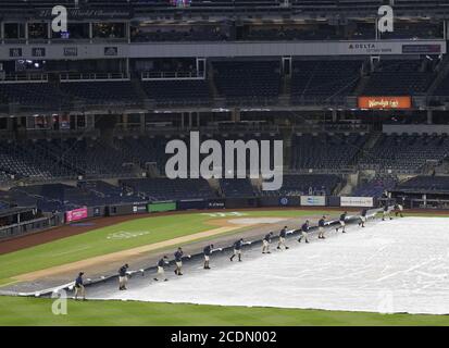 The Latest: Tarp on field at Truist Park during all-day rain - WDEF