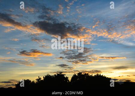 Colorful dramatic sky with cloud at sunset Stock Photo