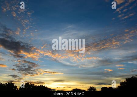 Colorful dramatic sky with cloud at sunset Stock Photo