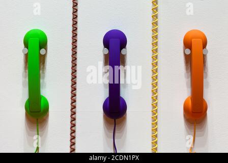 Color phones and phone cords Stock Photo