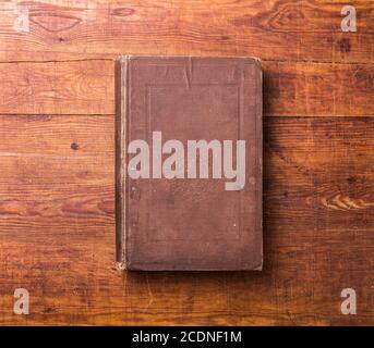 Photo blank book cover on textured wood background Stock Photo