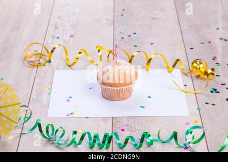 Birthday cupcake on table wood background Stock Photo