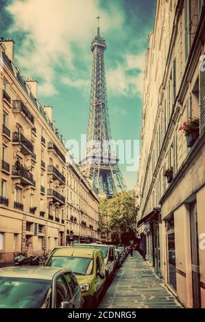 Eiffel Tower seen from the street in Paris, France. Vintage Stock Photo