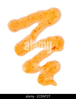 Orange thick jam drizzle, isolated on white background. Mandarin marmalade, Sea buckthorn jam, topping drops. Top view. Stock Photo