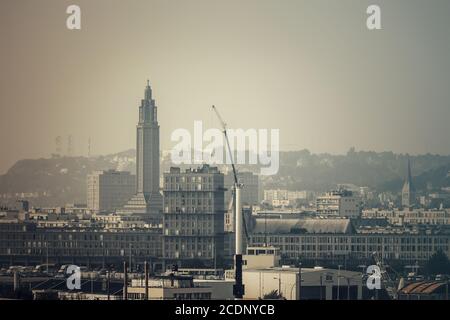 Hazy View from sea to the modern concrete - City architecture of Le Havre Stock Photo