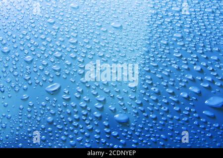 water drops on blue surface Stock Photo