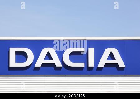 Villefranche, France - May 24, 2020: Dacia logo on wall of a dealer. Dacia is a Romanian car manufacturer and belong to Renault group Stock Photo