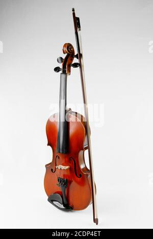 A violin with bow isolated on white background Stock Photo