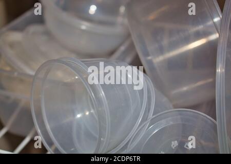 Pile of round plastic containers Stock Photo