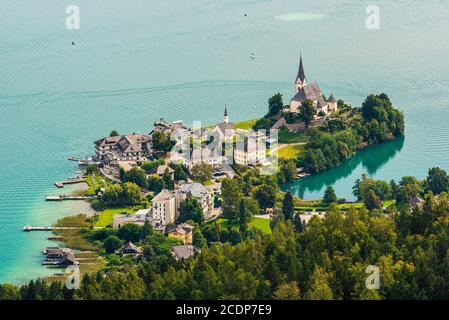 View of the Worthersee lake with Maria Worth church, Carinthia, Austria Stock Photo