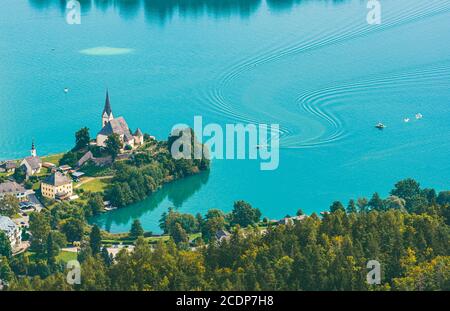 View of the Worthersee lake with Maria Worth church, Carinthia, Austria Stock Photo