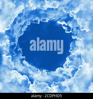 Sky with beautiful light clouds. Cloudy border, round frame, template. Religion concept heavenly sky background. Sunny day, divine shining heaven. Pea Stock Photo