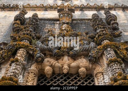 The famous Manueline style chapterhouse window at the Convent of Christ aka Convento de Cristo in Tomar, Portugal, Europe Stock Photo