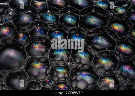 Colourful reflections and geometric patterns in this macro image Stock Photo