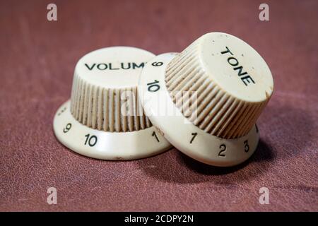 Old school guitar or bass volume and tone knobs Stock Photo