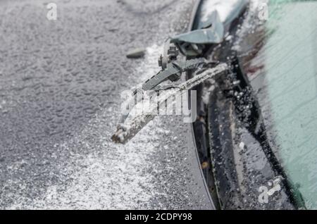 Car wipers covered with ice. Close-up Stock Photo