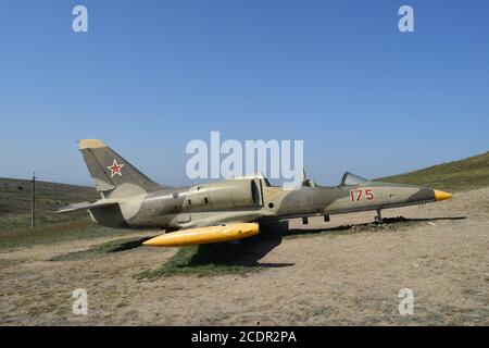 Monument of fighter aircraft near the Cossack village Ataman. Military hardware as a museum exhibit available for viewing. Open- Stock Photo