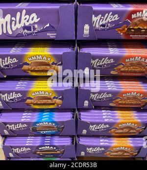 Viersen, Germany - July 9. 2020: Closeup of milka chocolate bars in shelf of german supermarket Stock Photo
