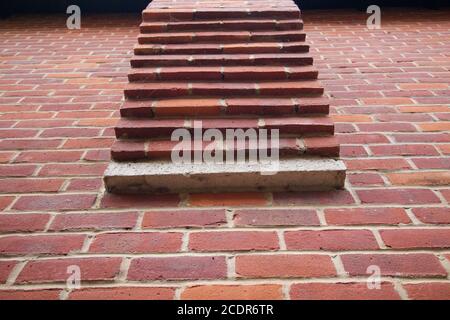 Architectural feature of stepped brickwork newly laid with mortar in between Stock Photo