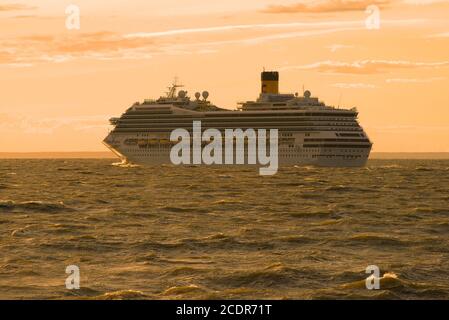 ST. PETERSBURG, RUSSIA - JUNE 20, 2018: The 'Costa Magica' cruise liner goes to the Gulf of Finland in the summer evening Stock Photo
