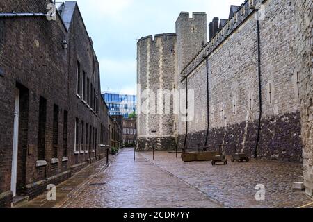 Tower of London buildings and alley, Her Majesty's Royal Palace and Fortress of the Tower of London, historic castle on the River Thames, London, UK Stock Photo