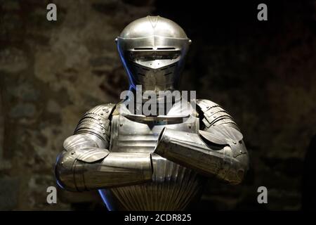 Display of historic armour, at the White Tower, Her Majesty's Royal Palace and Fortress of the Tower of London, London, UK Stock Photo