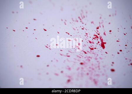 Red paint splatter Stock Photo