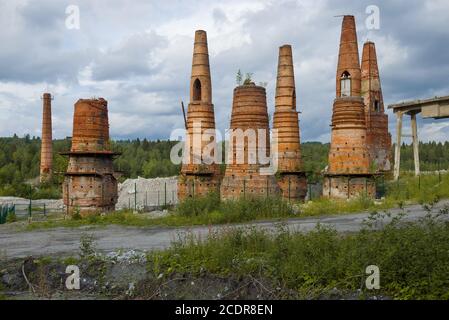 Lime kilns of an abandoned marble and lime factory on an August day. Ruskeala, Karelia Stock Photo