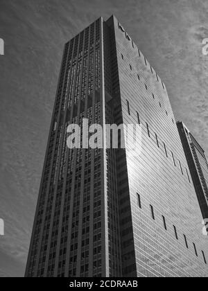Looking up at 300 East Randolph Street in Chicago, USA from ground level. Looming blue skyscraper designed by James Goettsch of Goettsch Partners Stock Photo