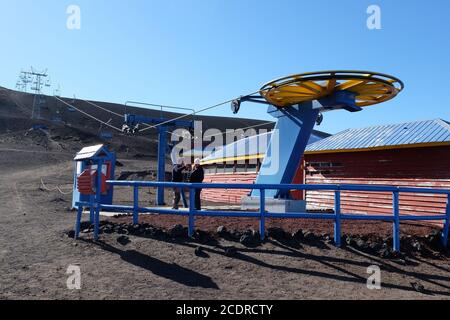 Ski lift ride over Osorno volcano giving extensive views over lakes and mountains. Stock Photo