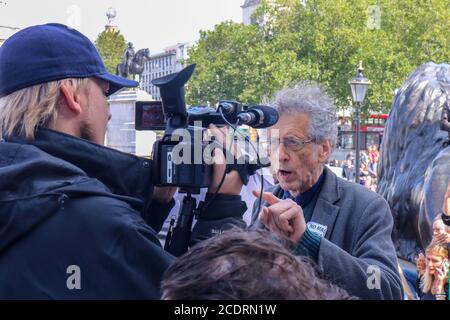 LONDON, ENGLAND, AUGUST 29 2020, Piers Corbyn (brother of former Labour leader Jeremy Corbyn) speaks to a camera man as thousands of Anti mask protesters gather at Trafalger Square against lockdown restrictions, mask wearing and vaccine proposals, Piers Corbyn addressing the crowd Credit: MI News & Sport /Alamy Live News Stock Photo