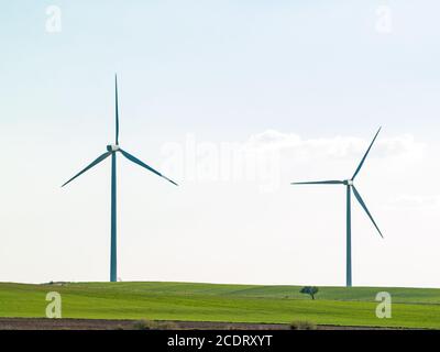 Windmill on countryside generating wind energy Stock Photo