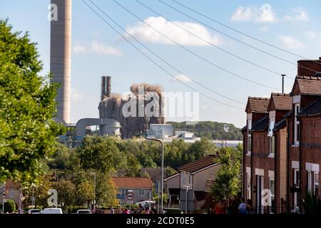 20 AUGUST 2020.   RUGELEY, STAFFORDSHIRE. UK.,  The boiler house to the coal fired power station at Rugeley is brought down with a controlled explosion during the demolition of the site to make way for new housing. The power station is situated just outside of the town. Stock Photo