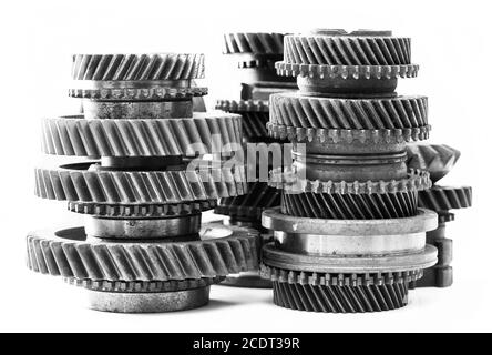 Gears, grunge cogwheels, real engine elements on white. Heavy industry Stock Photo