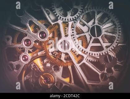 Mechanism, clockwork of a watch with jewels, close-up. Vintage luxury Stock Photo