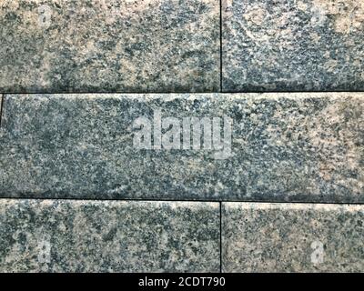 Concrete gray brick wall close-up. Stock Photo