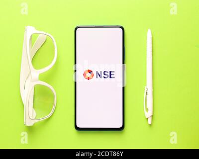 Assam, india - August 27, 2020 : NSE logo on phone screen stock image. Stock Photo