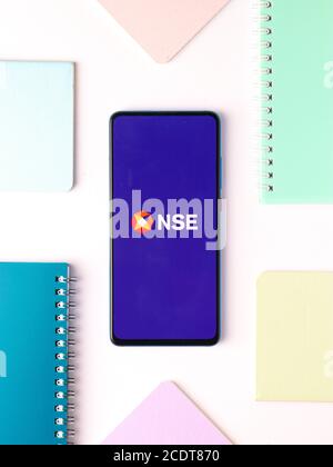 Assam, india - August 27, 2020 : NSE logo on phone screen stock image. Stock Photo