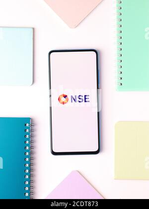 Assam, india - August 27, 2020 : NSE logo on phone screen stock image. Stock Photo