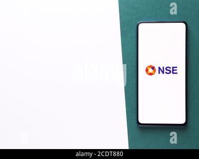 Assam, india - August 27, 2020 : NSE logo on phone screen stock image. Stock Photo