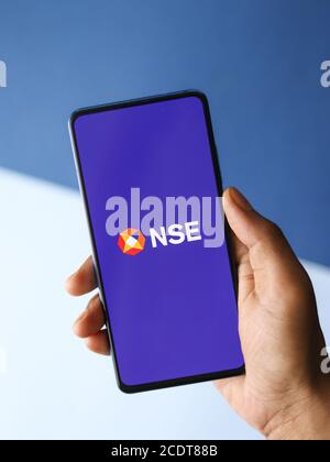 Assam, india - August 27, 2020 : NSE logo on phone screen stock image. Stock Photo