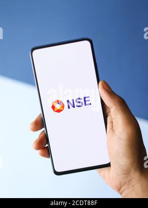 Assam, india - August 27, 2020 : NSE logo on phone screen stock image. Stock Photo