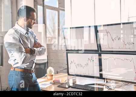 Businessman analyzing index on crypto currency diagram Stock Photo
