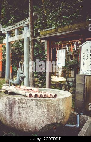 Purification fountain at shoren-in temple, Kyoto, Japan Stock Photo