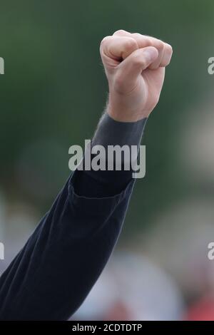 29ht of Aug 2020, London Ontario Canada.  Black Lives Matter protest in Victoria Park. People are showing their BLM fist. Luke Durda/Alamy Stock Photo